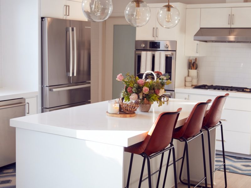 interior-view-of-beautiful-kitchen-with-island-counter-in-new-family-house.jpg